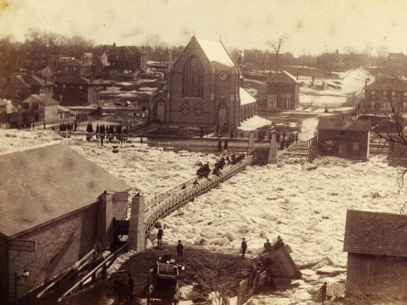 View of footbridge during flood of 1886.