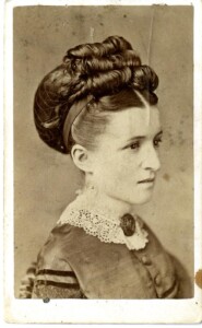 Woman with elaborate hairstyle.