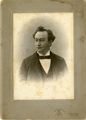 Man with glasses and a bow tie.